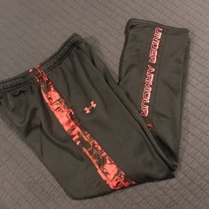 Under Armour black with red & black design on sides of pants.  (YXL)